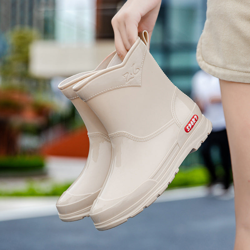 Damen Ankle‑Gummistiefel im Chelsea‑Stil mit glänzender Schutzschicht und griffiger Profilsohle Echoarhiv – Varelle
