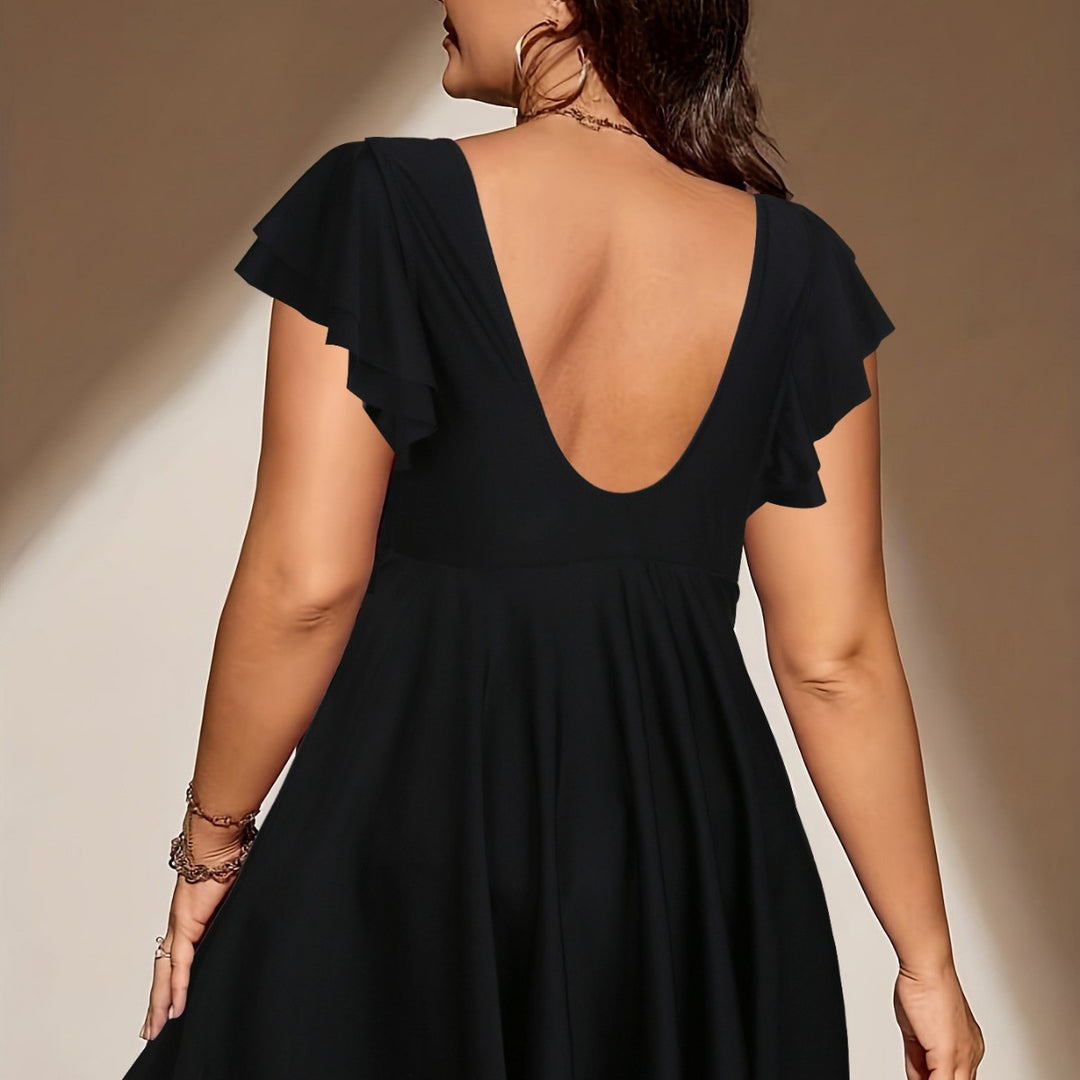 Damen Strandkleid mit leichtem V-Ausschnitt und voluminösen Rüschendetails Echo Archiv
