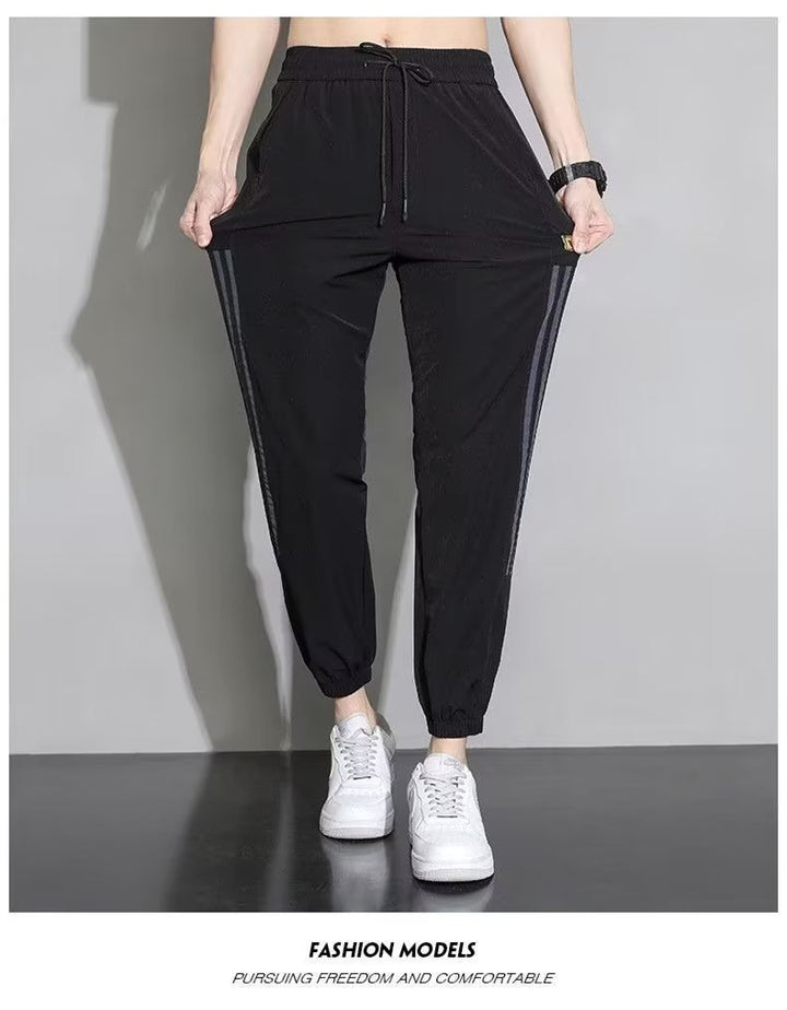 Damen Sportliche Trainingshose mit seitlichen Streifen Echoarchiv