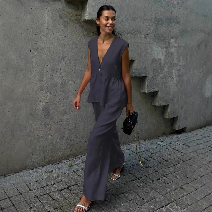 Damen luftiger Jumpsuit mit V-Ausschnitt und fließendem Schnitt Echo Archiv