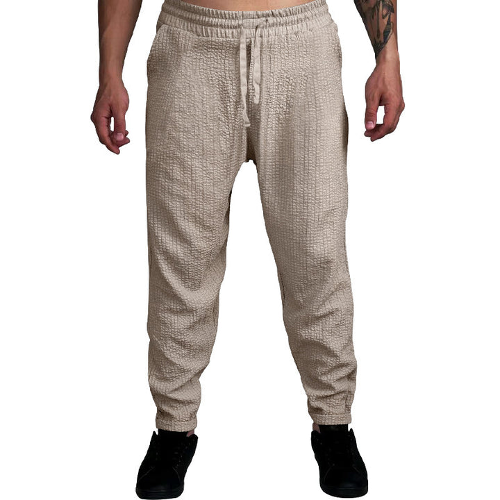 Herren Texturierte tapered Jogginghose mit Elastikbund, Tunnelzug & gerippten Knöchelbündchen – Sorevano