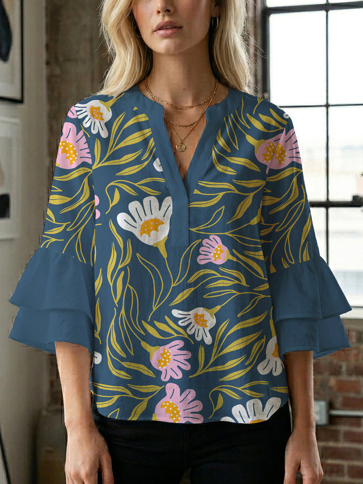Damen Elegantes Oberteil mit voluminösen Rüchenärmeln und floralem Druck Echo Archiv