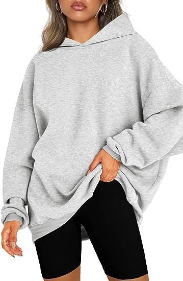 Damen nan oversized Kapuzenpullover im Boxy-Cut mit innen angerautem Fleece, überschnittener Schulter und verlängertem Rückenteil Echo Archiv
