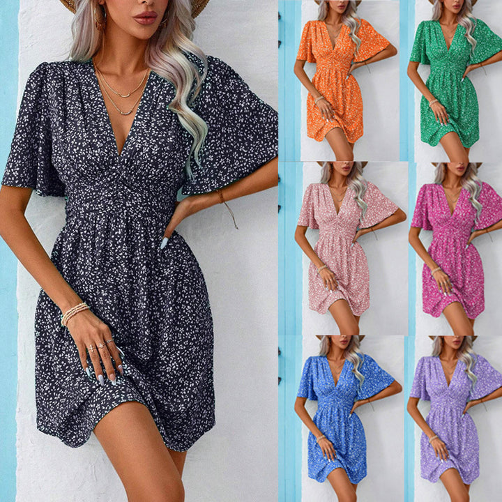 Damen Sommerkleid mit V-Ausschnitt, geraffter Brustpartie und Flügelärmeln Echo Archiv