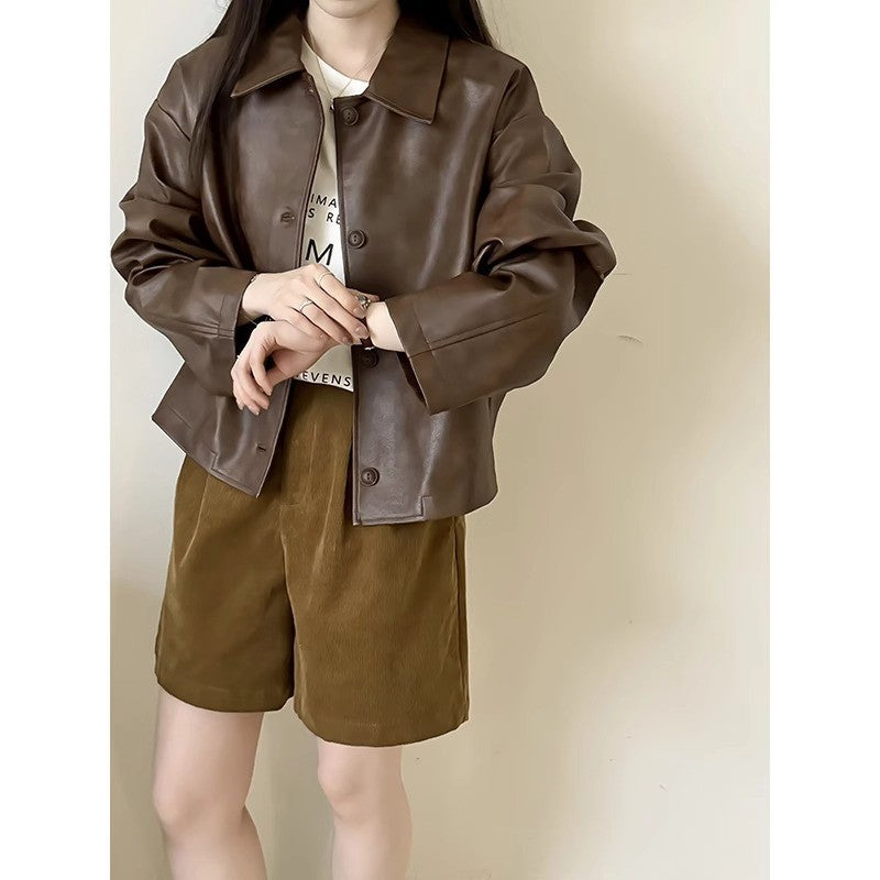 Damen Boxy‑Kunstleder‑Hemdjacke mit verdeckter Knopfleiste und überschnittenen Schultern Echoarchiv