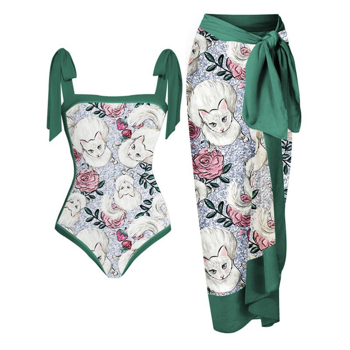 Damen Einteiler Badeanzug mit elegantem Wickelrock und modischen Riemen Echo Archiv