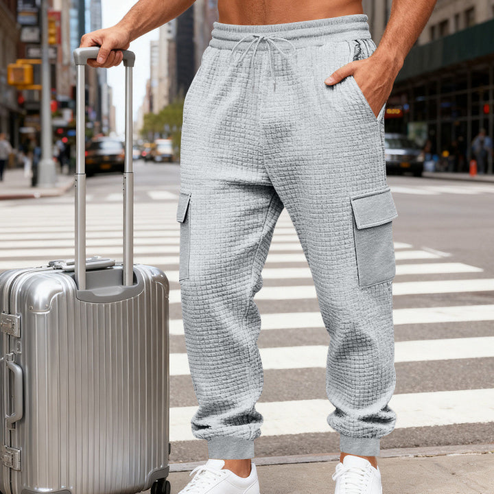 Herren Texturierte Cargo-Jogginghose mit Tunnelzug, aufgesetzten Klappentaschen und gerippten Bündchen – Bravaro