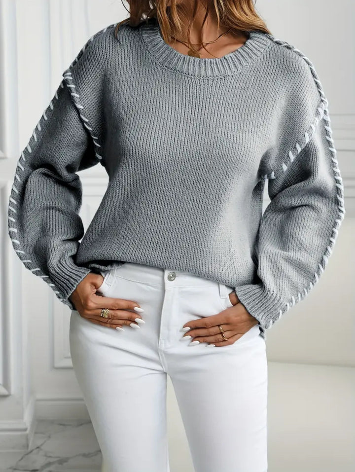 Damen Oversize Strickpullover mit dekorativem Kordel‑Zopf an Ärmeln – Mavelle