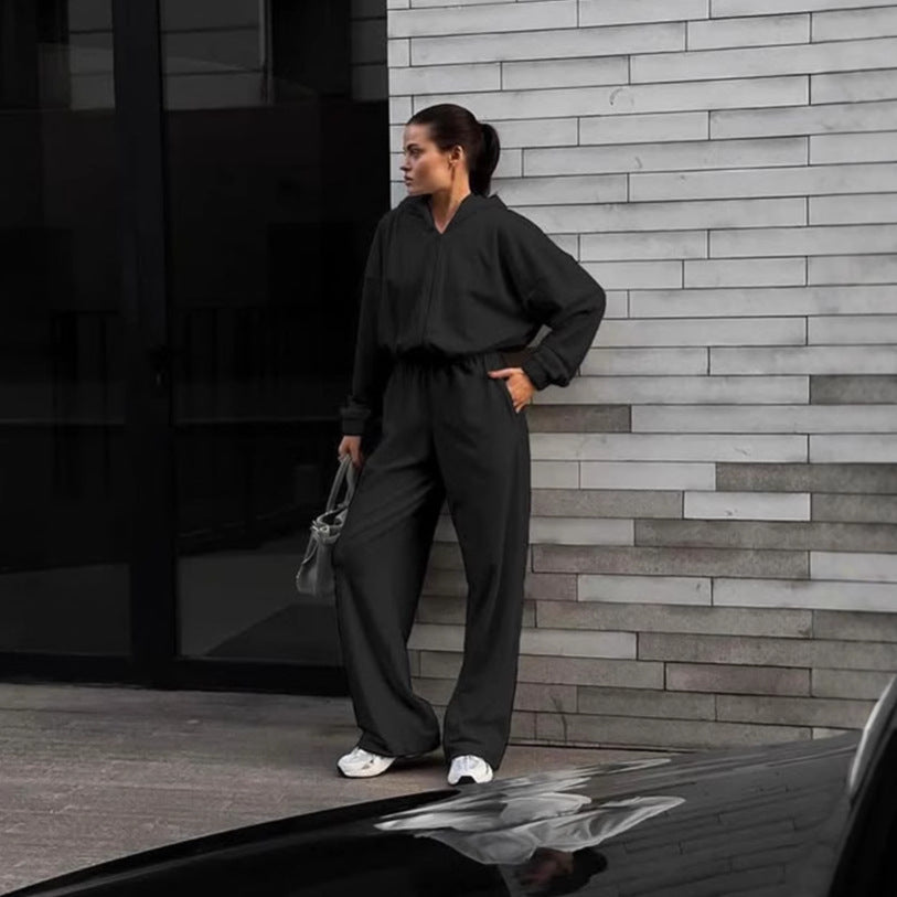 Damen Kapuzen-Jumpsuit mit weitem Bein elastischer Taille und Frontreißverschluss – Solévia