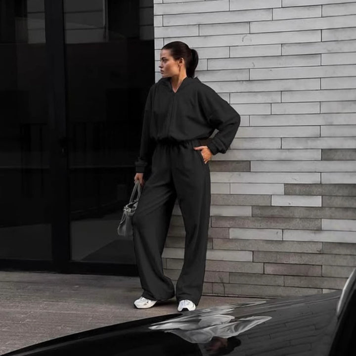 Damen Kapuzen-Jumpsuit mit weitem Bein elastischer Taille und Frontreißverschluss – Solévia