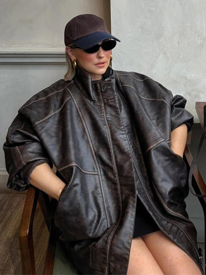 Damen Oversize Lederimitat-Mantel mit markanten Ziernähten und Stehkragen Echoarchiv