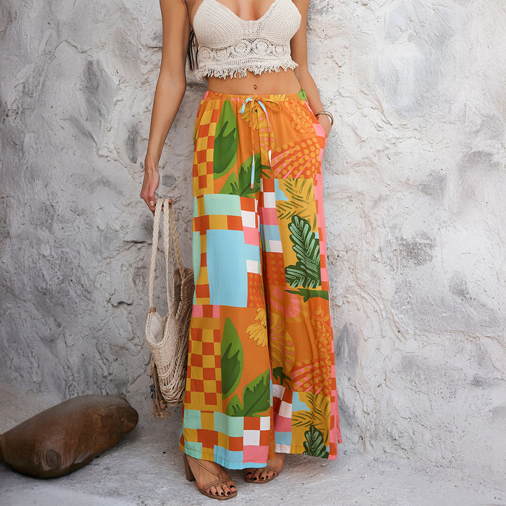 Damen weite Palazzo-Hose mit Kordelbund, Eingrifftaschen und mediterranem Kachelprint – Avélisse