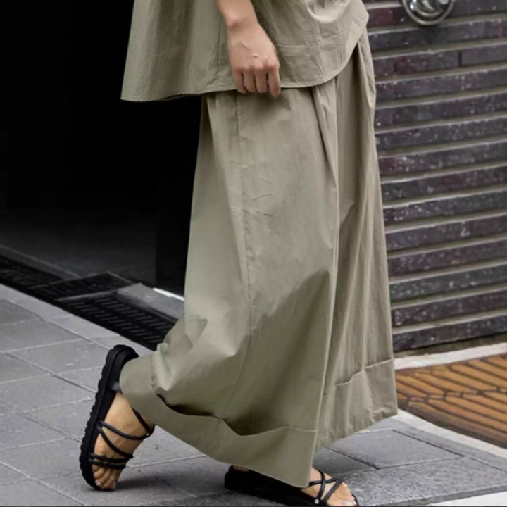 Damen Weite Palazzo-Hose mit hohem Bund und breitem Saum Echoarchiv