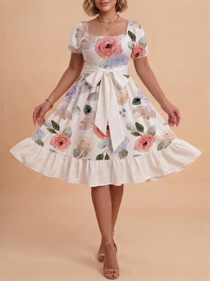 Damen Sommerliches Blumenkleid mit taillierbarem Gürtel und voluminösen Ärmeln Echo Archiv