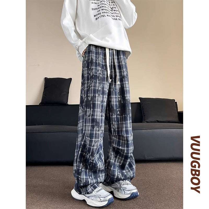Herren weite karierte Flanellhose mit Kordelzug im Baggy-Schnitt Echoarchiv