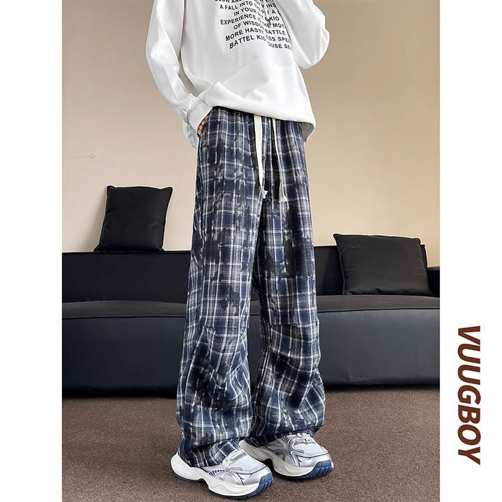 Herren weite karierte Flanellhose mit Kordelzug im Baggy-Schnitt Echoarchiv