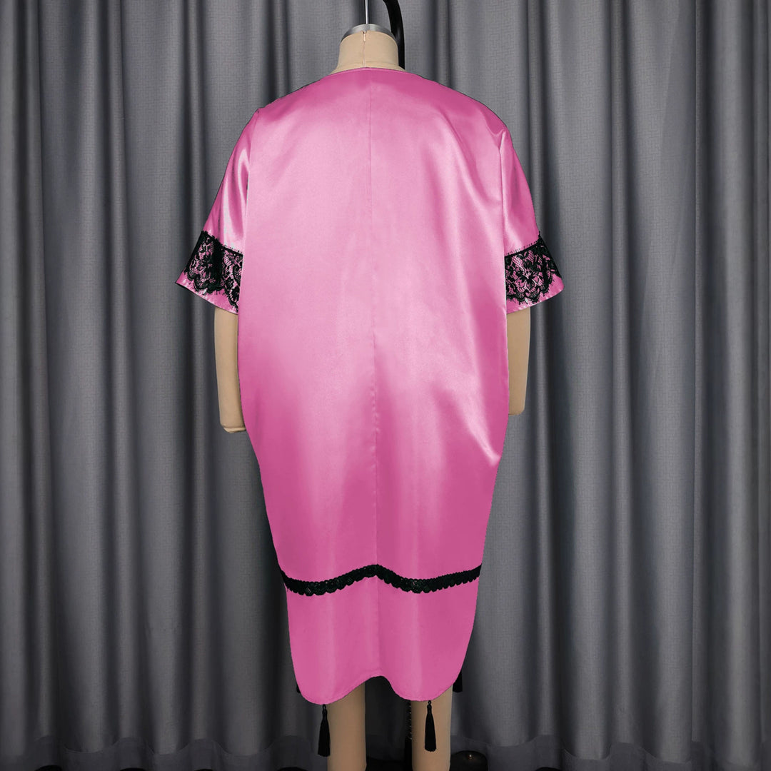 Damen elegantes Kaftankleid mit raffinierten Spitzenärmel und dekorativen Quasten Echo Archiv
