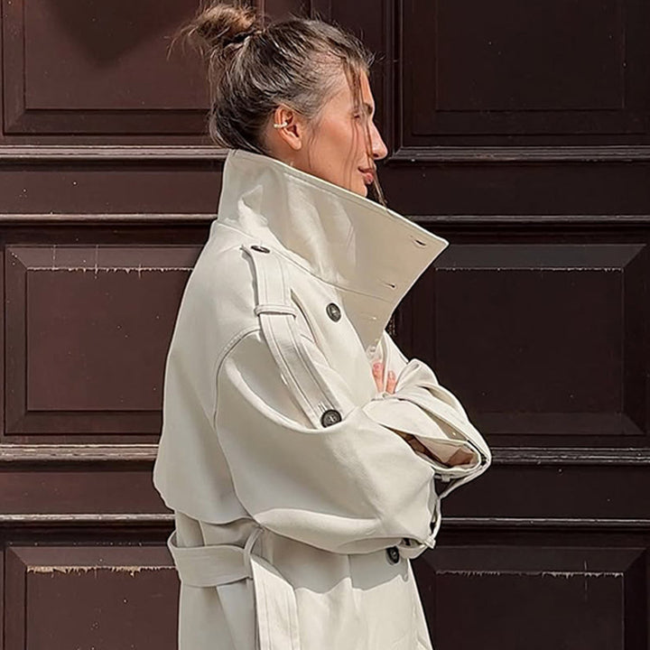 Damen tailloser Long-Trenchcoat im Oversize-Schnitt mit doppelter Knopfleiste und Schulterklappen Echoarchiv
