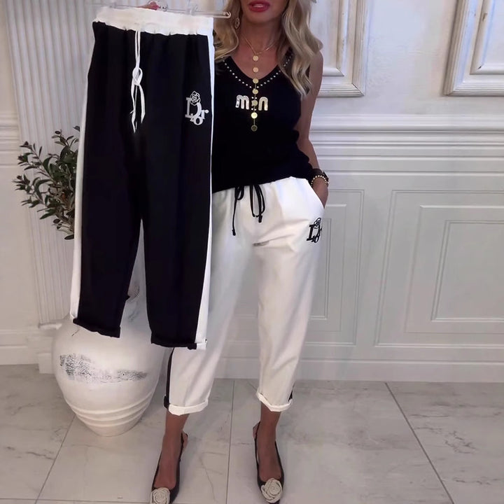 Damen nan Cropped-Jogginghose mit kontrastierendem Bund, seitlichem Zierstreifen, Kordelzug und Logostickerei Echo Archiv