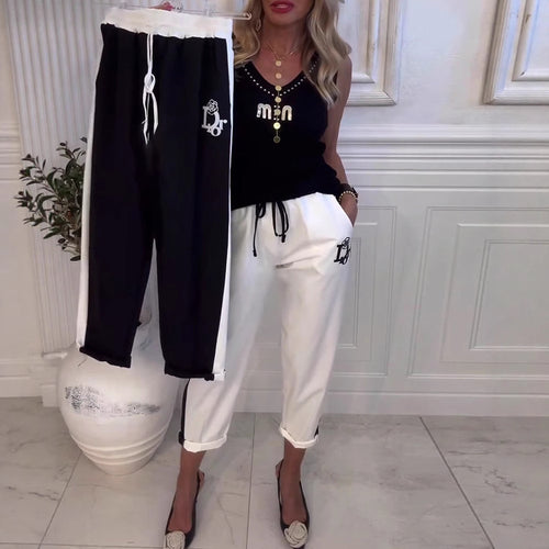 Damen nan Cropped-Jogginghose mit kontrastierendem Bund, seitlichem Zierstreifen, Kordelzug und Logostickerei Echo Archiv