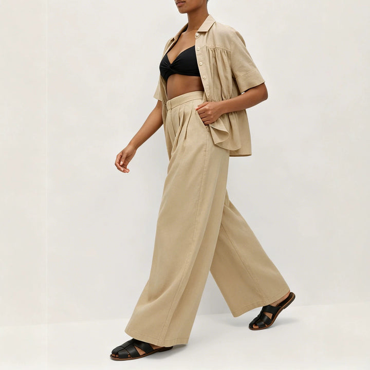 Damen Weite High‑Waist Leinenoptik Palazzo‑Hose mit Bundfalten und Eingrifftaschen – Avérine