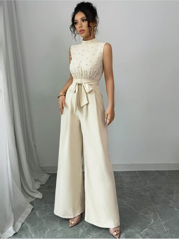 Damen Eleganter Jumpsuit mit Perlenbesatz, Stehkragen und weitem Palazzo-Bein – Solévia