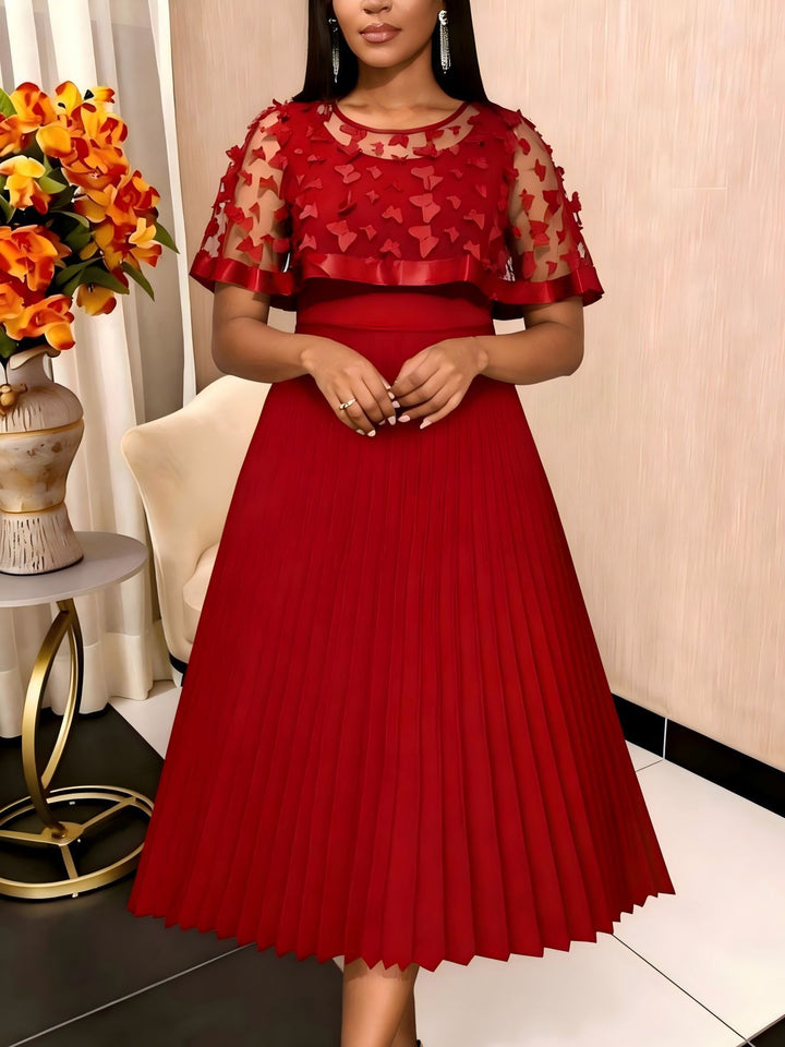 Damen elegantes Abendkleid mit plissiertem Rock und transparenten Puffärmeln Echo Archiv