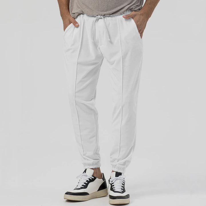 Herren Tapered-Jogginghose im Leinenlook mit Bügelfalte und Bündchen Echoarchiv