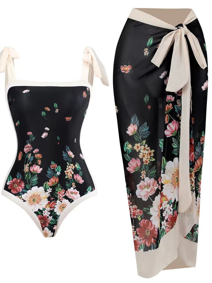 Damen Einteiler Badeanzug mit asymmetrischem Schnitt und eleganter Palazzo-Hose Echo Archiv