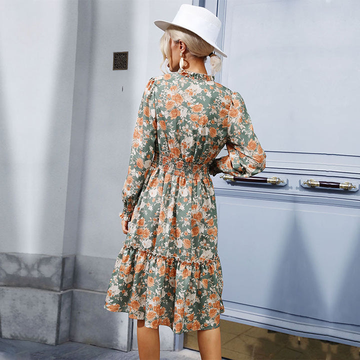 Damen Midikleid mit floralem Print, geschlitzter Knopfleiste, smockierter Taille und Volantstufe Echoarchiv