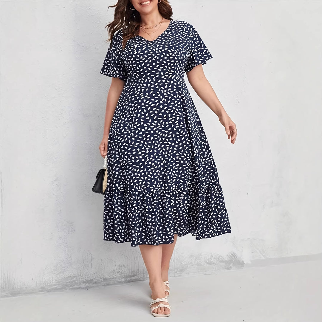 Damen Midi-Kleid mit fließendem Schnitt und verspieltem Muster Echo Archiv