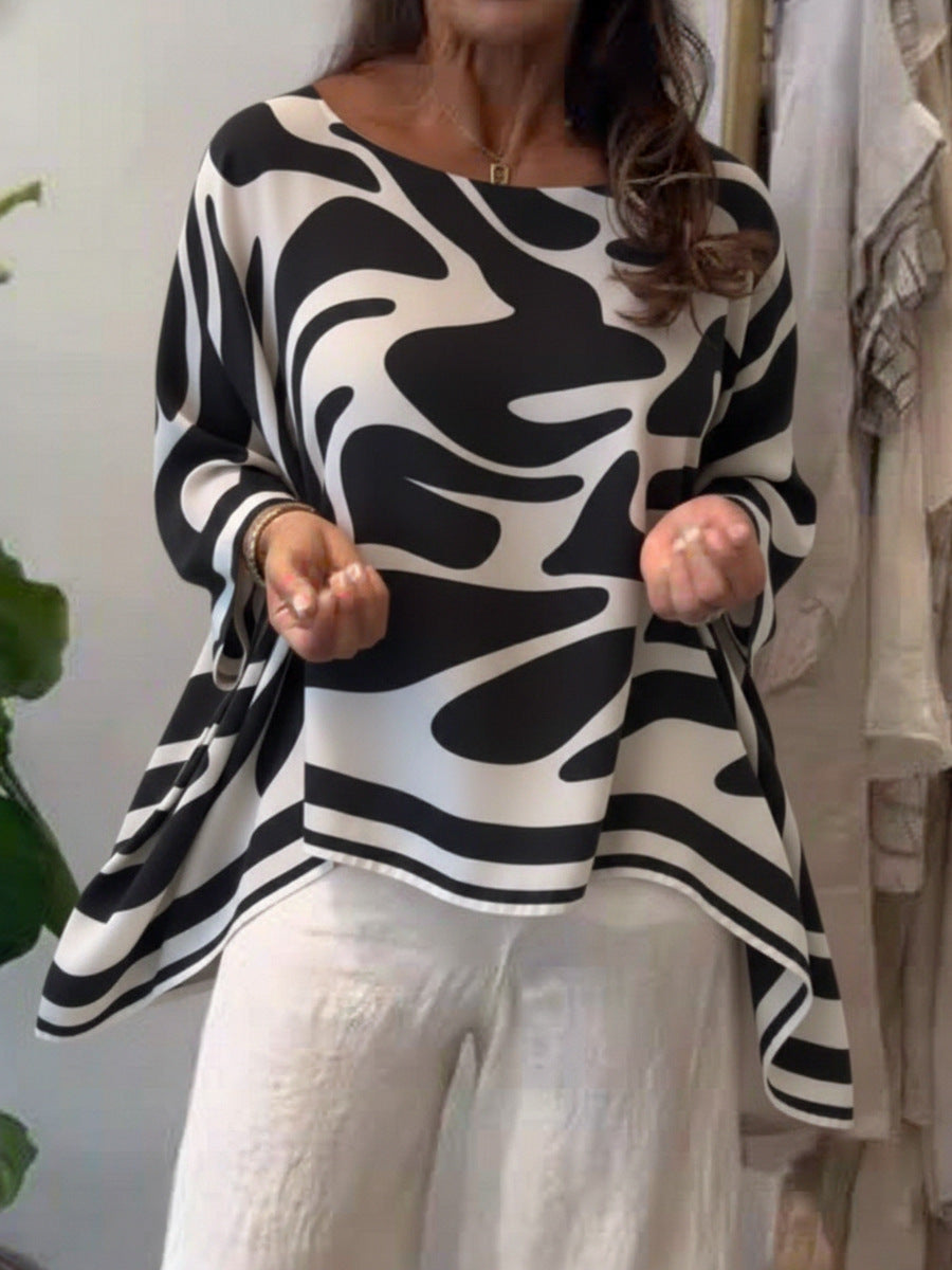 Damen Oversize Sommerbluse mit abstraktem Print, Fledermausärmeln und asymmetrischem Saum – Élovi