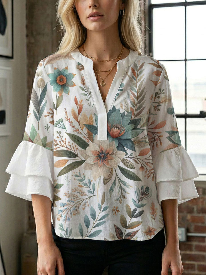 Damen Blusenshirt mit voluminösen Ärmeln und kreativem Druckdesign Echo Archiv