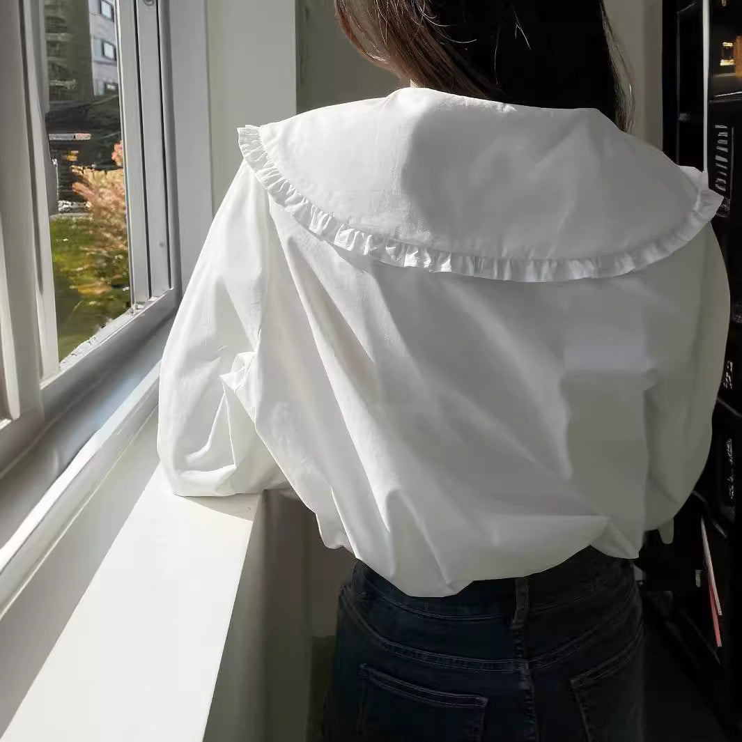 Damen Bluse mit übergroßem Rüschenkragen und fein gearbeitetem Tailoring Echoarchiv