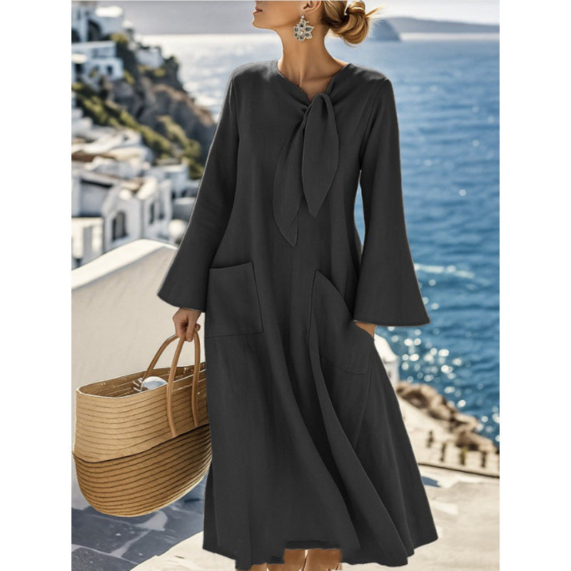 Damen Leichtes Maxikleid mit Bindeschleife, Glockenärmeln und aufgesetzten Taschen – Valéora