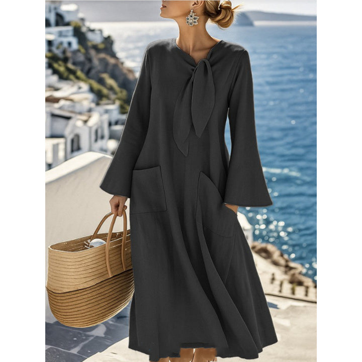 Damen Leichtes Maxikleid mit Bindeschleife, Glockenärmeln und aufgesetzten Taschen – Valéora