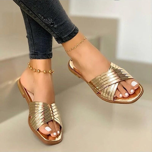 Damen Geflochtene Metallic-Slipper mit überkreuzten Riemen und flacher Komfortsohle – Lioré