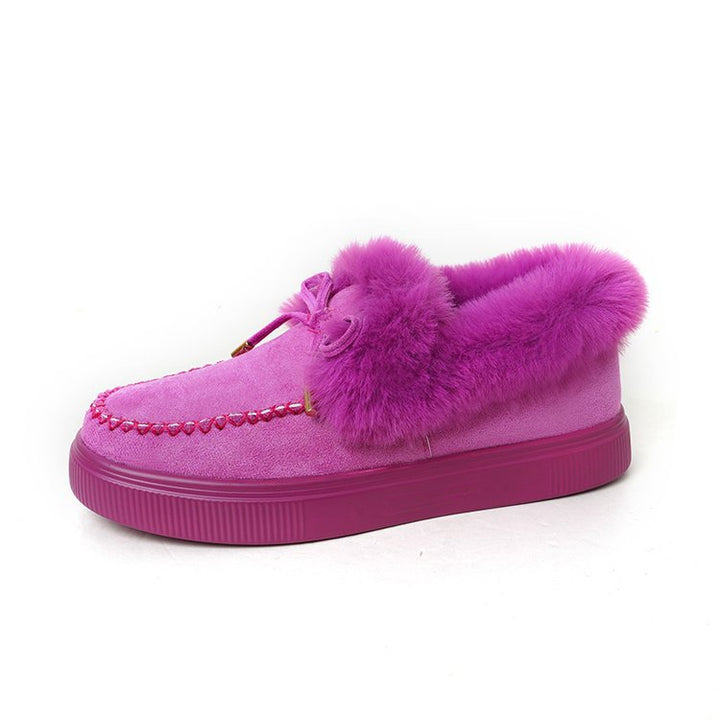 Damen Kuschel‑Mokassin‑Slipper mit hochfloriger Fellmanschette, dekorativer Steppnaht und leichtem Plateau‑Sohlenprofil Echo Archiv
