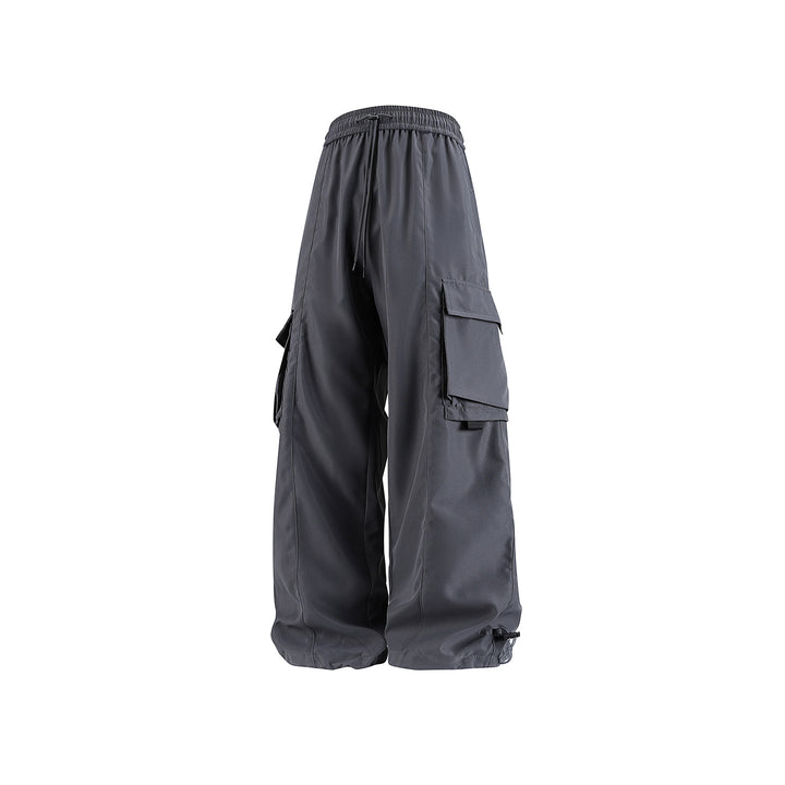 Herren weite Utility‑Cargohose im Baggy‑Cut mit Tunnelzugbund, großen Klappentaschen und verstellbarem Beinabschluss Echo Archiv