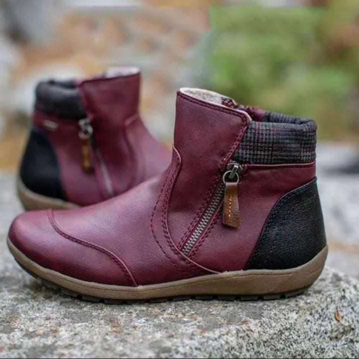 Damen nan lederoptik gefütterte Stiefelette mit seitlichem Reißverschluss und rutschfester Laufsohle Echo Archiv