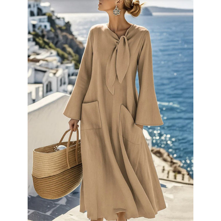 Damen Leichtes Maxikleid mit Bindeschleife, Glockenärmeln und aufgesetzten Taschen – Valéora