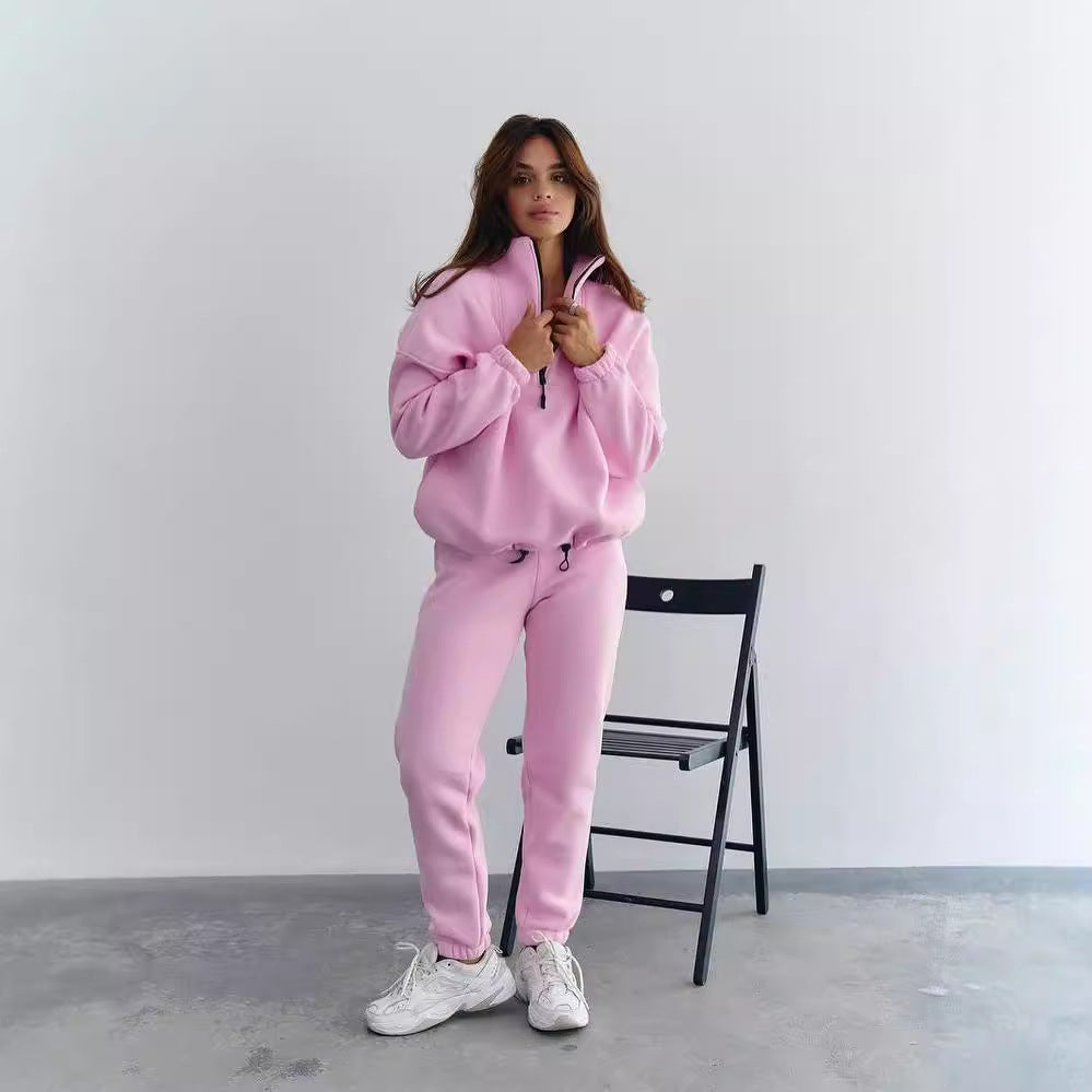 Damen Athleisure-Zweiteiler aus dickem French-Terry mit hohem Stehkragen, halbem Reißverschluss und Tunnelzughose Echoarchiv