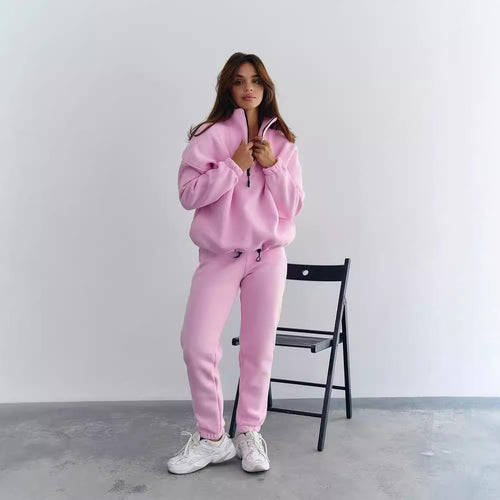 Damen Athleisure-Zweiteiler aus dickem French-Terry mit hohem Stehkragen, halbem Reißverschluss und Tunnelzughose Echoarchiv
