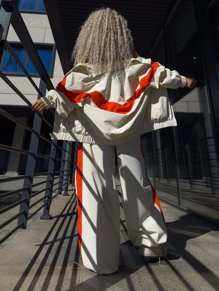 Damen leichte Oversize-Windbreakerjacke mit Kontrastpanelen, Tunnelzugbund und elastischen Bündchen – Célinea