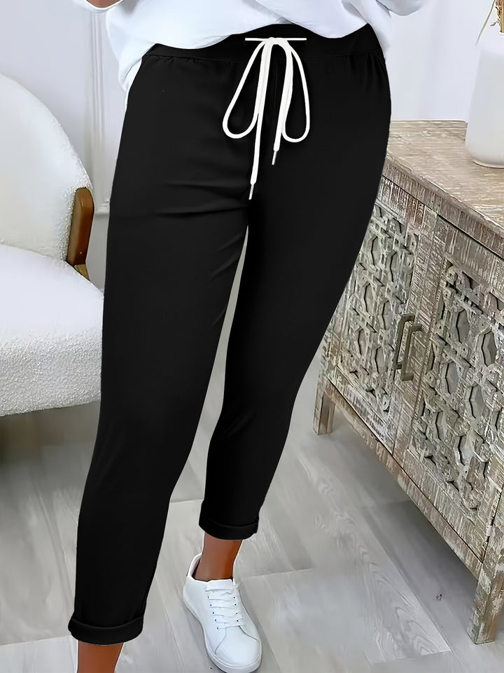 Damen Slim-Fit Jogginghose mit Tunnelzug und Umschlagbündchen Echoarchiv