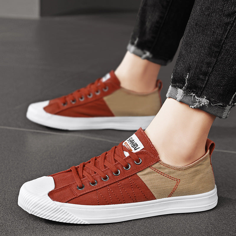 Unisex niedrige Canvas-Sneaker mit verstärkter Gummi-Zehenkappe und kontrastierenden Textilpaneelen – Norré
