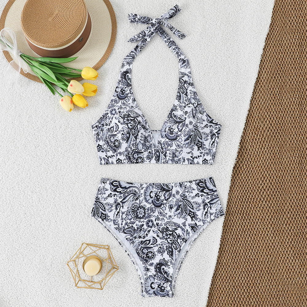 Damen Bikini-Set mit hoch geschnittenem Hosenrock und floralem Muster Echo Archiv