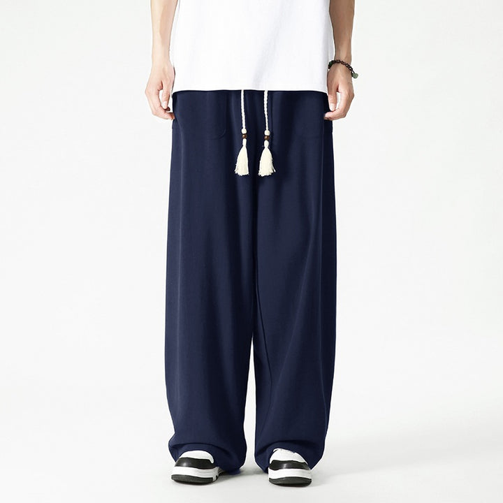 Herren Weit geschnittene Lounge-Hose mit Quasten-Kordel, elastischem Bund und aufgesetzten Taschen Echo Archiv