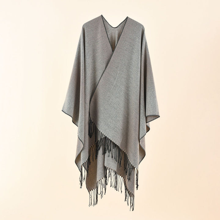 Damen Cape-Poncho aus leichtem Glanzstrick mit Ombre-Effekt und Fransensaum Echo Archiv