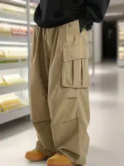Herren Oversize-Baggy-Cargohose im Urban-Utility-Stil mit elastischem Tunnelzugbund und Mehrfachklappentaschen Echo Archiv
